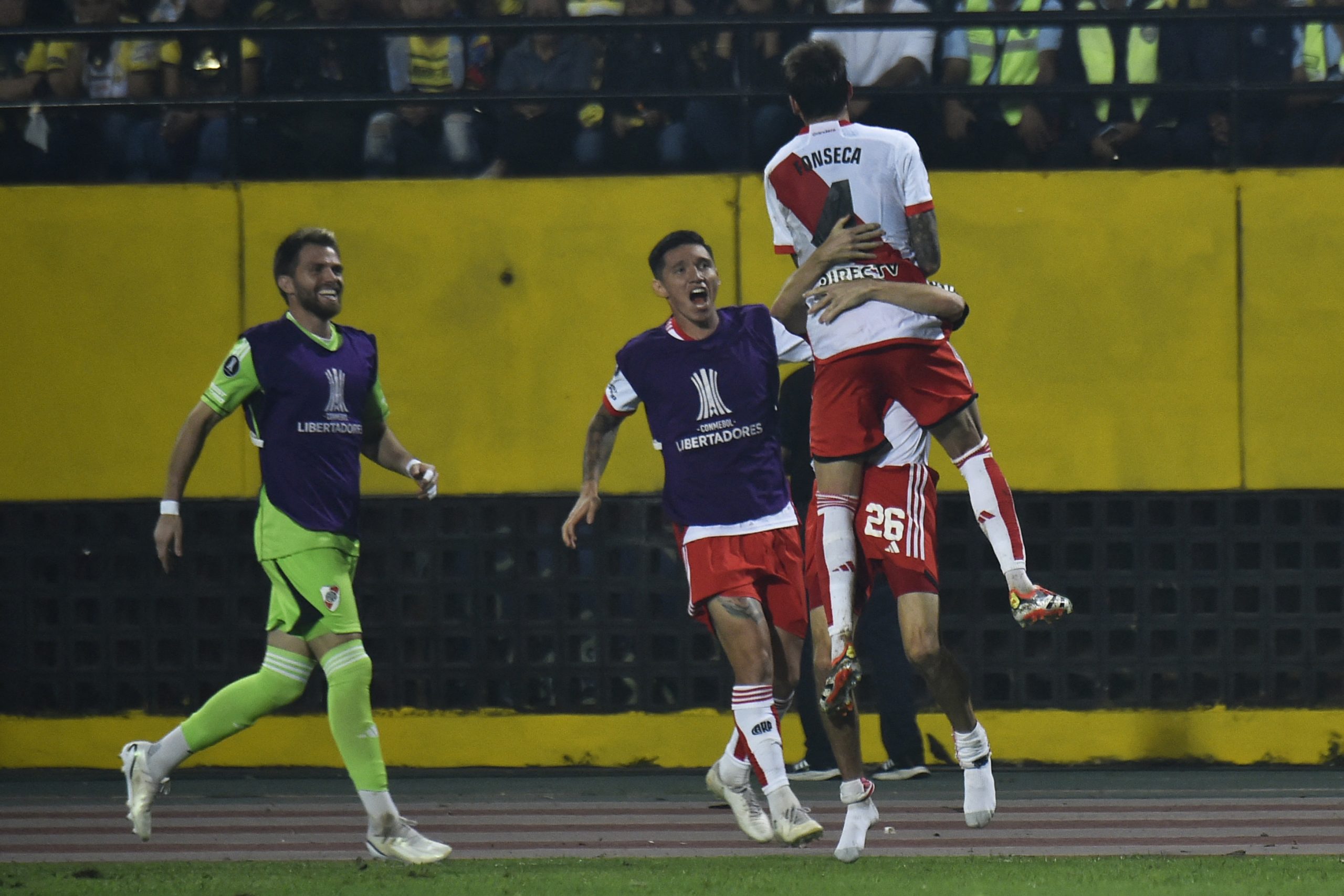 River Plate's Italian midfielder Nicolas Fonseca (R) celebrates with teammates after scoring a goal during the Copa Libertadores group stage first leg football match between Venezuela's Deportivo Tachira and Argentina's River Plate at the Polideportivo de Pueblo Nuevo Stadium in San Cristobal, Venezuela, on April 2, 2024. (Photo by Schneyder Mendoza / AFP) (Photo by SCHNEYDER MENDOZA/AFP via Getty Images)