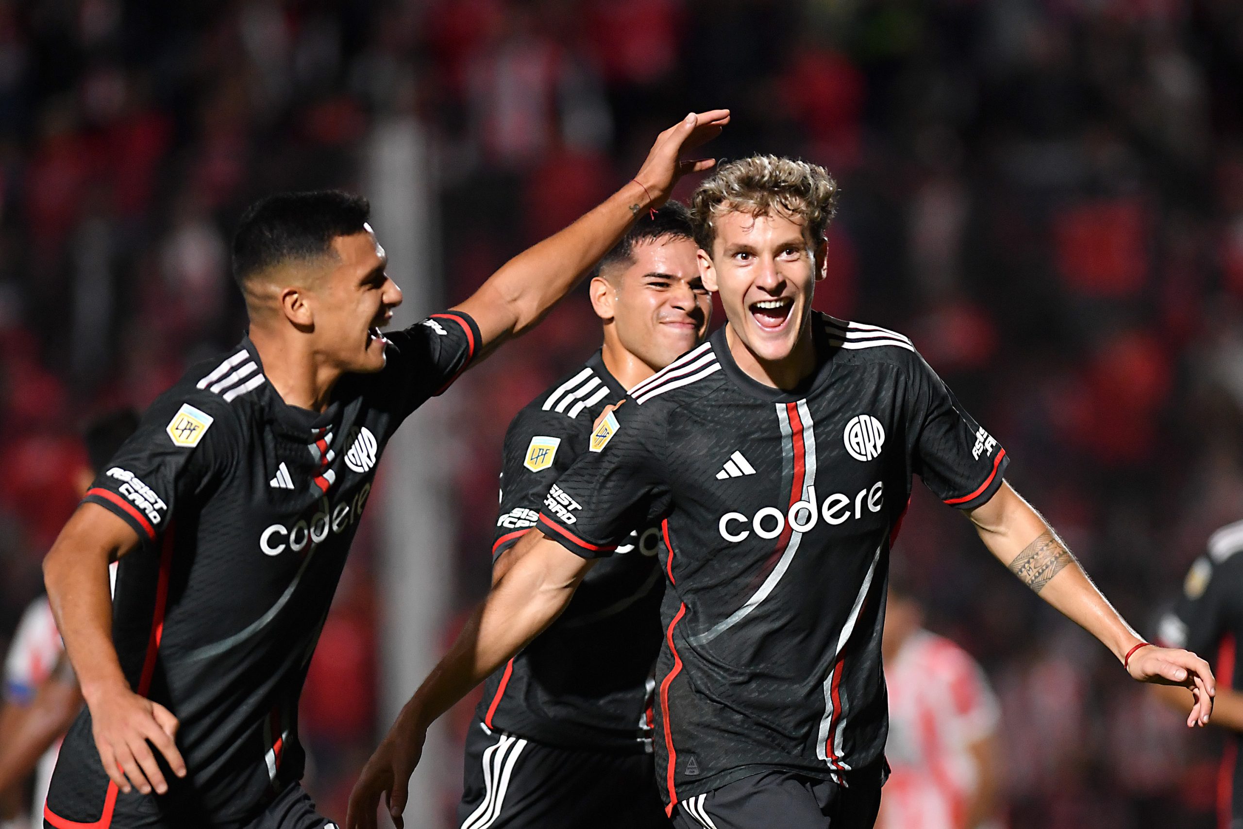 CORDOBA, ARGENTINA - APRIL 15: Facundo Colidio (R) of River Plate celebrates with teammates after scoring the team's second goal during a Copa de la Liga Profesional 2024 match between Instituto and River Plate at Estadio Monumental Presidente Peron on April 15, 2024 in Cordoba, Argentina. (Photo by Hernan Cortez/Getty Images)