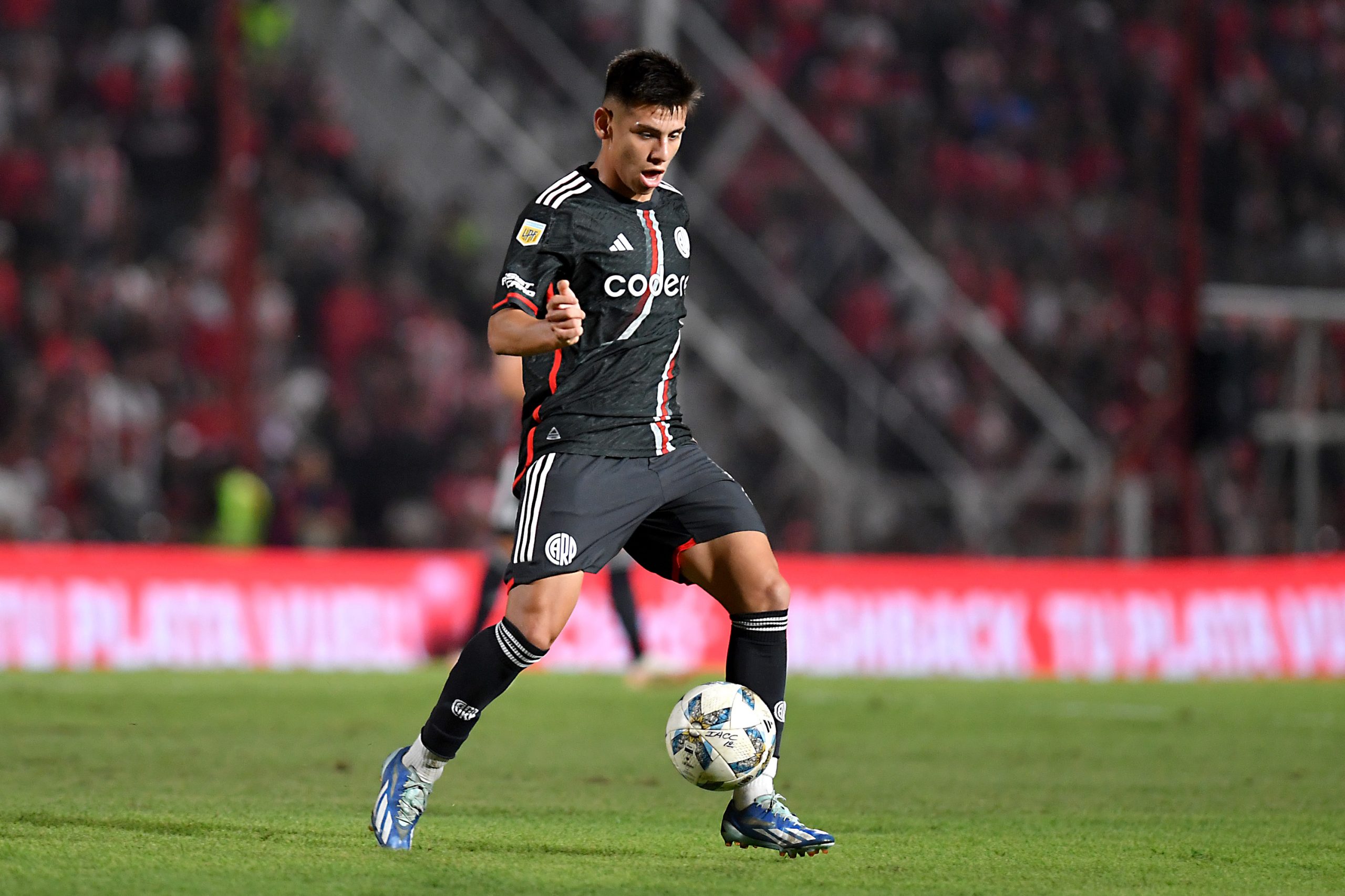 CORDOBA, ARGENTINA - APRIL 15: Claudio Echeverri of River Plate controls the ball during a Copa de la Liga Profesional 2024 match between Instituto and River Plate at Estadio Monumental Presidente Peron on April 15, 2024 in Cordoba, Argentina. (Photo by Hernan Cortez/Getty Images)