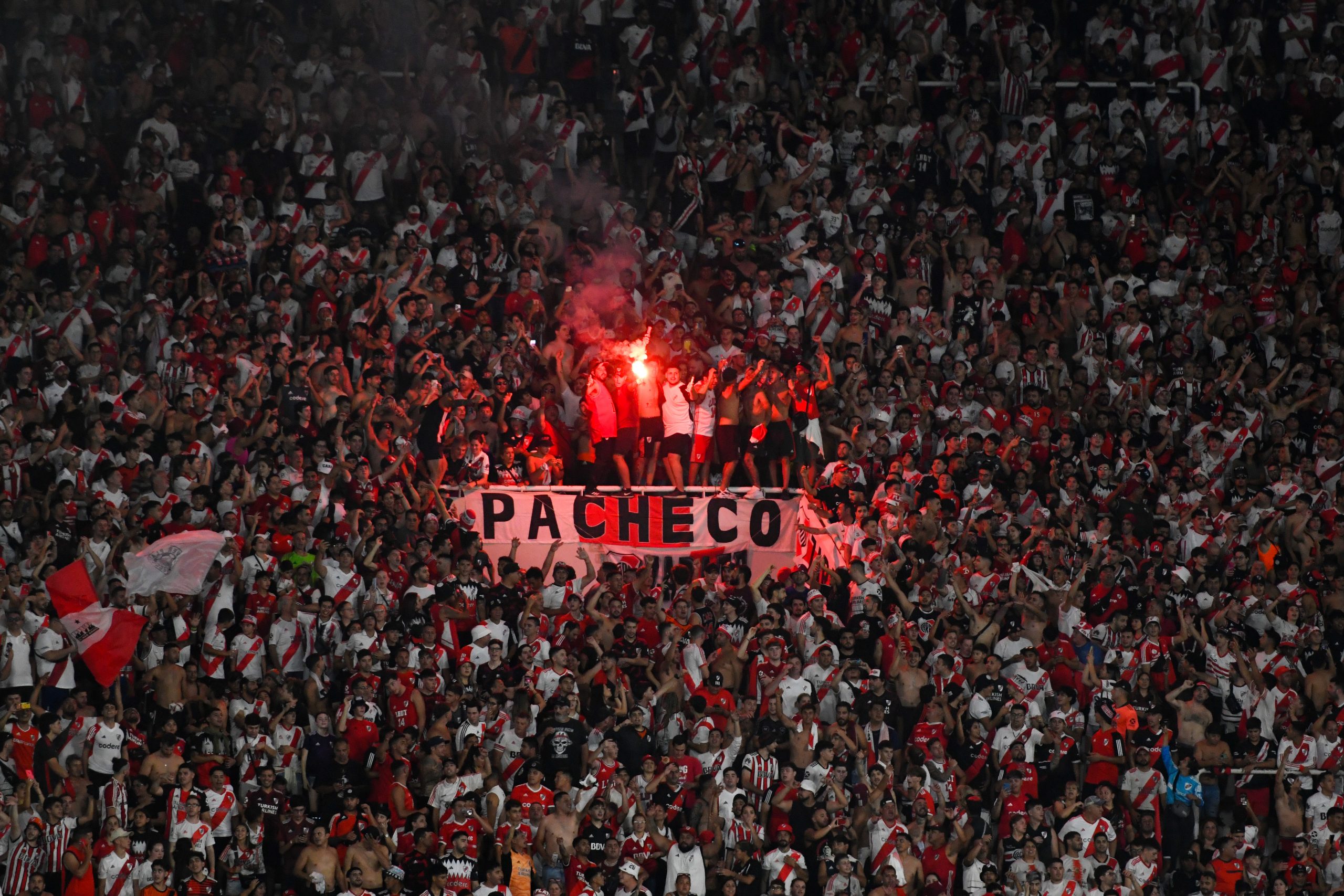 CORDOBA, ARGENTINA - MARCH 13: Fans of River Plate cheer with flares during the Supercopa Argentina 2024 match between River Plate and Estudiantes de la Plata at Mario Alberto Kempes Stadium on March 13, 2024 in Cordoba, Argentina. (Photo by Hernan Cortez/Getty Images)