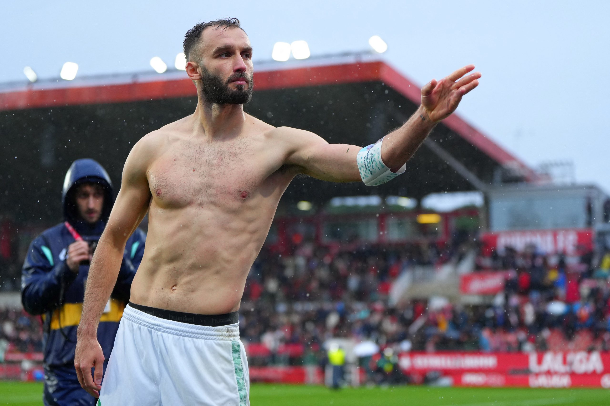 Real Betis' Argentinian defender #06 German Pezzela reacts at the end of the Spanish league football match between Girona FC and Real Betis at the Montilivi stadium in Girona on March 31, 2024. (Photo by Pau Barrena / AFP) (Photo by PAU BARRENA/AFP via Getty Images)