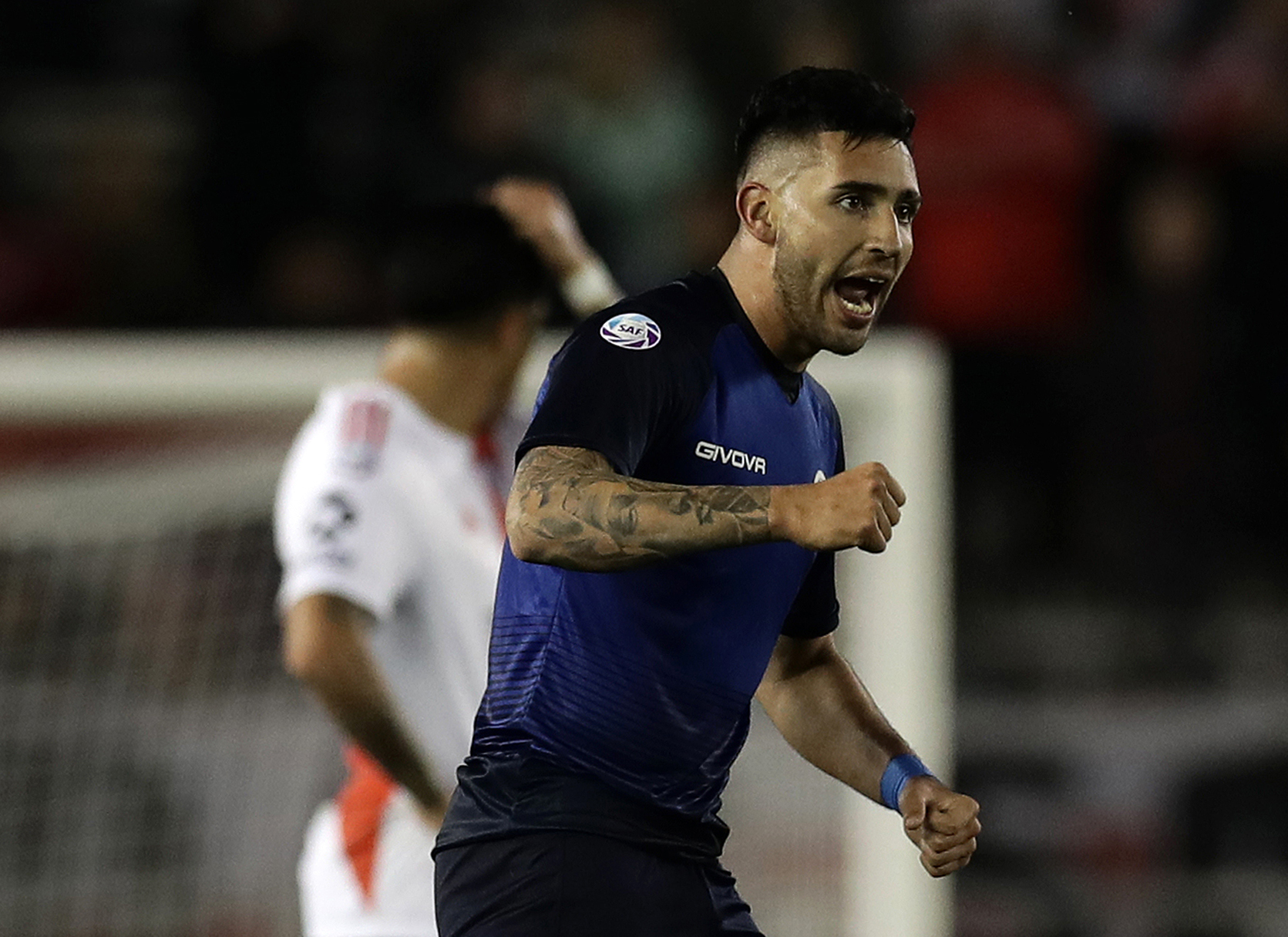 Talleres' forward Nahuel Bustos celebrates after scoring a goal against River Plate during an Argentina First Division Superliga Tournament football match at the Monumental stadium, in Buenos Aires, on August 25, 2019. (Photo by ALEJANDRO PAGNI / AFP) (Photo credit should read ALEJANDRO PAGNI/AFP via Getty Images)