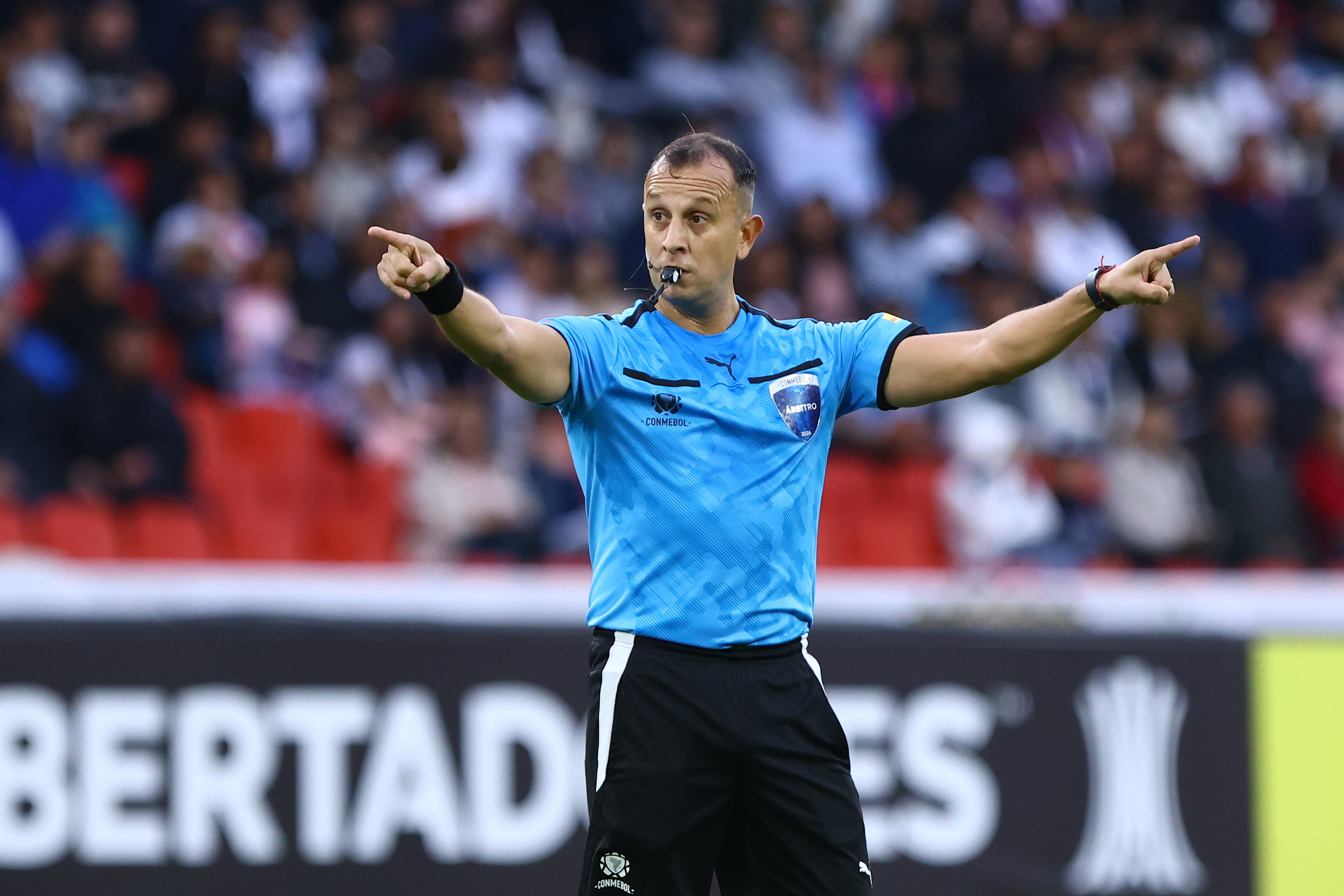 QUITO, ECUADOR - MAY 28: Referee Dario Herrera reacts during a Copa CONMEBOL Libertadores Group D match between LDU Quito and Universitario Deportes at Rodrigo Paz Delgado Stadium on May 28, 2024 in Quito, Ecuador. (Photo by Franklin Jacome/Getty Images)